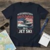 Never Underestimate An Old Man On A Jet Ski t-shirt design featuring an older man riding a jet ski with