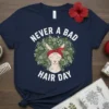 Never a Bad Hair Day t-shirt featuring a sphynx cat wearing a bandana, surrounded by lush greenery
