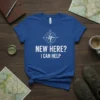 Blue t-shirt with white text "New Here? I Can Help" and a compass graphic, ideal for travel and adventure enthusiasts