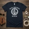 New Smyrna Beach t-shirt with white anchor, waves, and rope circle graphic