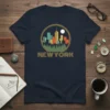 Vintage New York City skyline graphic tee with colorful buildings and trees, includes text "NEW YORK"
