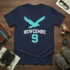 Navy blue t-shirt with teal Newcombe 9 athletic design and flying bird graphic