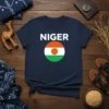 Navy t-shirt with the Niger flag design, featuring the text "NIGER" above a circular flag graphic