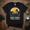 T-shirt featuring "Night Music Woodland Chorale" text with a group of opossums singing under a moonlit sky graphic