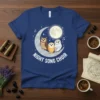 Night Song Choir t-shirt design with three cartoon owls sitting on a crescent moon under a full moon, with musical