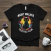 NIGHT WALKER CELESTIAL FELINE text on a black t-shirt with a black cat graphic, moon, and colorful abstract shapes