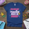 NO CAP MY TEACHER RIZZ IS BUSSIN' text design on a blue t-shirt with bright pink and blue accents