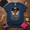 T-shirt with "NO DON'T TOUCH MY HAIR" text and illustration of a Black girl with afro puffs
