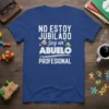 Spanish text "No Estoy Jubilado Soy un Abuelo Profesional" on a royal blue t-shirt, featuring a cartoon grandpa graphic