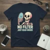 Skeleton holding a mirror with a sad face, text reads "NO FILTER JUST DEAD INSIDE" on a navy t-shirt