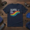 Navy blue t-shirt with white text "no matter which lane you swim" and a rainbow wave graphic, Speedo logo