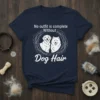 Navy blue t-shirt with white text "No outfit is complete Without Dog Hair" and two dog illustrations inside a circle