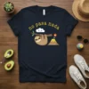 No pasa nada Spanish quote t-shirt featuring a cute sloth hanging from a branch with a smiling cloud and volcano