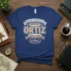 T-shirt with Spanish text "No Soy Perfecto Pero Soy Ortiz Que Es Casi Lo Mismo" in bold lettering and decorative