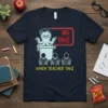 Octopus teacher graphic with "NO TAKI WHEN TEACHER TAKI" text, on a navy t-shirt, classroom scene