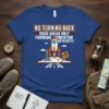 No Turning Back Road Ahead Only Forward Momentum No Regrets quote on a blue t-shirt with a rocket launch graphic