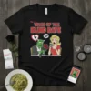 No. 1 Tales of the Blind Date T-Shirt featuring a green monster offering roses to a surprised woman, with a