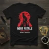 Black t-shirt featuring "NOIR FATALE CRIMSON FANGS MOONLIT HUNTRESS" text with a black cat and red moon graphic