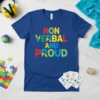 Blue t-shirt with colorful text "NON VERBAL AND PROUD" and puzzle pieces, promoting autism awareness