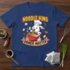 Noodle King Ramen Master t-shirt design with a cute bunny chef eating ramen. Yellow text and red banner