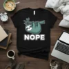 Black t-shirt with "Nope" text and a hanging sloth graphic, perfect for sloth lovers