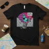 Nope. Pigeon T-Shirt with a turquoise pigeon wearing sunglasses and holding a NOPE. sign, standing on a trash can