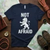 Not Afraid quote t-shirt with a white lion graphic design on quality cotton t-shirt fabric