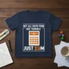 Math pun t-shirt with calculator graphic saying "NOT ALL MATH PUNS ARE TERRIBLE JUST ΣUM"