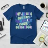 T-shirt with the quote "NOT JUDGING BUT I AM ANALYZING YOUR BEHAVIOR" in colorful, groovy font with brain and data