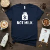 Navy blue t-shirt with white text "NOT MILK." and a white milk carton icon with an 'X' inside