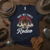 Not My First Rodeo t-shirt design featuring a cowboy on a horse with mountains and boots