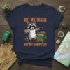 Not My Trash Not My Dumpster t-shirt with a raccoon wearing goggles next to a trash dumpster