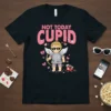Not Today Cupid text with a grumpy cupid graphic wearing sunglasses and armor on a black t-shirt