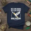 T-shirt with text "NOT A DOG PERSON, NOT A CAT PERSON BIRD PERSON!" and a graphic of a cockatiel bird