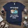 Navy t-shirt with "not to brag but I totally got out of bed today" text and a sleeping sloth graphic