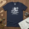 Occupational Therapy empowering everyday life quote on a navy blue t-shirt with graphic elements of a brain, gears, and a