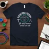 Navy t-shirt with white text "OCCUPATIONAL THERAPY No one knows what we do" and circular graphic of hands forming a