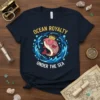 Ocean Royalty Under The Sea t-shirt with a crowned fish swimming in a water circle