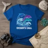 Ocean's Call t-shirt with three leaping dolphins over a stylized ocean wave, white text below