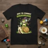 Off To Commit Shenanigans t-shirt design with a frog wizard riding a snail, holding a potion and magnifying glass
