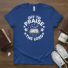 Blue t-shirt with "off to PRAISE the LORD" text, musical notes, and an open Bible graphic