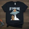Off To Wreak Havoc text above a cartoon cat in a UFO abducting a building, black t-shirt design