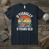O'FISHALLY 9 YEARS OLD fishing birthday t-shirt design with a cartoon fish in a boat, sunset background, and birthday hat