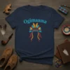 Ogimaama text above a colorful Native American headdress graphic on a navy blue t-shirt