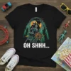 OH SHHH... text on a black t-shirt with Bigfoot, alien, and cat riding a roller coaster through a forest