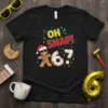 Oh Snap! 67 birthday t-shirt with a gingerbread man wearing a Santa hat and sunglasses, and a broken donut forming