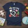 Navy t-shirt with "Oink Baa Moo I'm 2" text and farm animal graphics including a cow, pig, sheep, barn, and