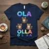 Navy t-shirt with text "OLA OLLAA O L A A" and three cute tabby kittens, colorful galaxy-style font