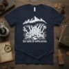 Old Gods of Appalachia t-shirt design featuring a kraken-like creature amidst mountains and trees