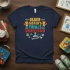 Older Sister's Trials Survivor quote on a navy t-shirt with lion graphics and icons representing challenges